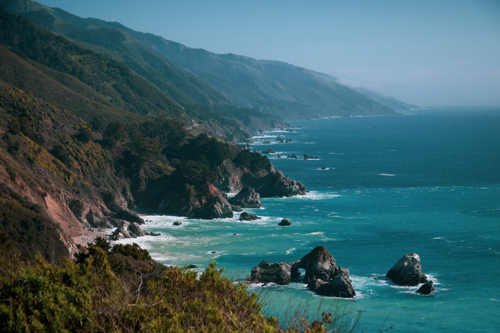 rocky beach on foot of hills